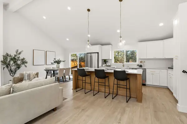 Interior paint, open-concept kitchen & living room, Junction City, OR | Painted Peak Paint Co.